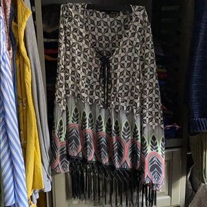 Dress blouse with tassels at bottom